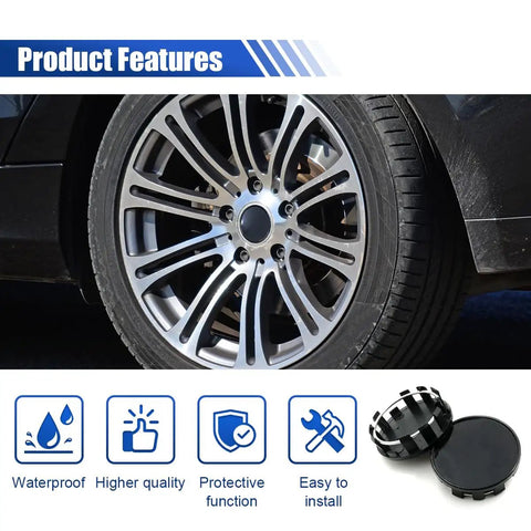 Upgrade Your Whip With These Slick Black Wheel Center Caps Providing Easy Snap Fit Mounting To Keep Rust Off Your Rim Hubs While Keeping Your Daily Driver Looking Tight On The Road. Image shows 54mm black wheel hub caps on silver alloy wheel.