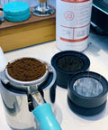 Slick Adjustable Height 58mm Espresso Coffee Distributor Needle Leveler With Aluminum Handle for preparing ground coffee.