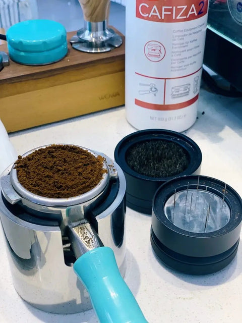 Slick Adjustable Height 58mm Espresso Coffee Distributor Needle Leveler With Aluminum Handle for preparing ground coffee.