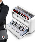 Portable Battery Operated Bill Counter With UV And MG Detection, 800 Bills Per Minute, shown with business professional.