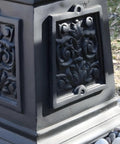 Base of the 9.5 Ft Five Arm Victorian Outdoor Post Light in Black Finish with decorative detailing and access panel.