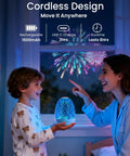 Child holding Night Light Bluetooth Speaker With 3D Glass Fireworks Lamp, colorful display, USB-C charge, in a bedroom setting.