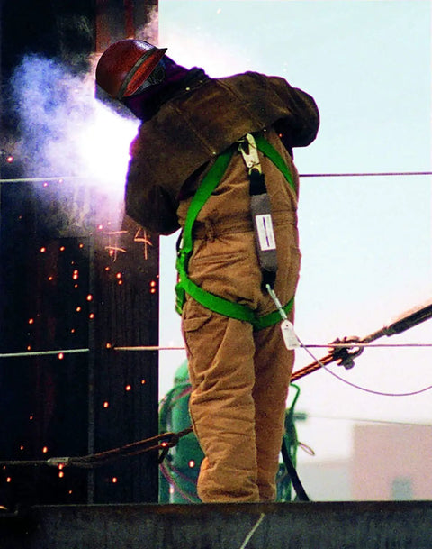 Welder wearing Skullgard Style Safety Hard Hat With Fas Trac Ratchet Suspension Non Slotted Cap Phenolic Resin Construction