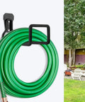 Heavy Duty Metal Hose Holder Wall Mount For Garden And Expandable Hoses with green hose coiled, mounted on outdoor wall.