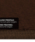 Close-up of Skid Resistant Carpet Stair Treads Set Of 15 In Chocolate Brown, showing 1/4 inch pile height and bound edges.