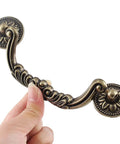 10 Piece Drop Drawer Handles Set With 5 Inch Hole Centers And 6.2 Inch Total Length Bronze Bail Cabinet Pulls close-up detail