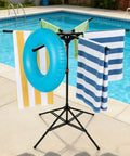 Outdoor Pool Towel Rack, Freestanding 42 to 71 Inch Adjustable Stand With Four Legs and Six Foldable Arms by poolside
