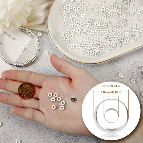Six Millimeter Flat Round Spacer Beads Pack Of 1500 Silver Rondelle Beads for Jewelry Making shown in hand with size details