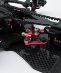 Close-up of Durable Aluminum Alloy Steering Kit for 1 to 10 scale RC drift cars with CNC machined assembly in ultra pink accent.