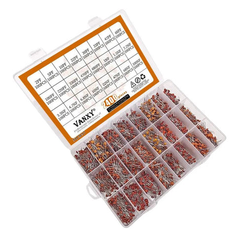 Ceramic Capacitor Kit 2400Pcs Multilayer Monolithic Chip Caps 2pF To 100nF 50V Assortment Set in box with labeled compartments.