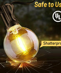 Close-up of Lit 196ft Outdoor Globe LED String Lights Warm White Shatterproof Bulbs showing glowing globe and UL certification.