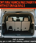 SUV trunk with Soft Shackles Recovery Kit With Half Inch By Twenty Two Inch Tow Shackle And Snatch Ring 56000 Lbs Capacity storage bag