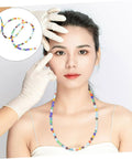 Pentagram Glass Spacer Beads And Bracelet Making Kit With Earring Crafting Tools displayed with colorful necklace and gloves.