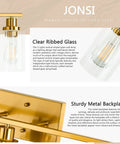 Three Light Brushed Gold Vanity Light With Fluted Glass Shades For Bathroom Modern Gold Over Mirror Fixture Elegant Satin Finish Contemporary Bath Lighting showing detailed glass and metal backplate close-up.