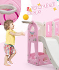 Toddler enjoying Toddler Slide And Climber Playset For Backyards Or Indoors A 9 In 1 Freestanding Kids Playground with hoops