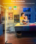 65 Inch Color Changing LED Floor Lamp With Music Sync Remote And App Control in a cozy bedroom setting