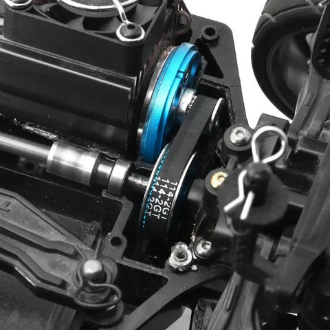 Radio Control Car Transmission Upgrade Kit With Low Noise Belt Drive Conversion For TT02 1 To 10 Scale Radio Control Cars CNC Machined Gears System Durable High Precision Parts To Boost Power Transfer And Smooth Shifts. Blue CNC machined belt drive installed in TT02 RC car transmission.