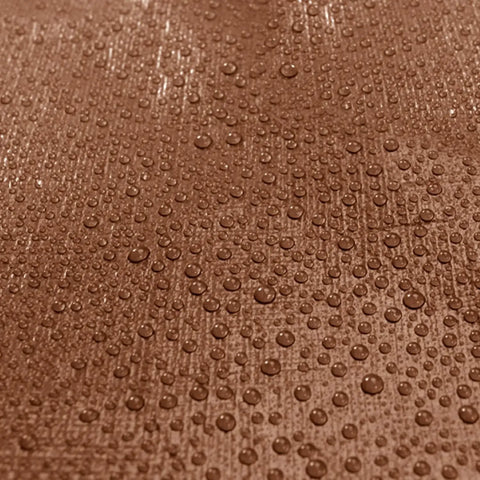 Close-up of waterproof surface on brown Beefy 30x40 Ft Tarp Cover 10 Mil Waterproof All Weather Protective Sheet for Equipment and Gear