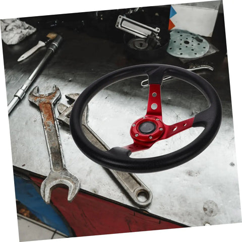 Universal 14 Inch Red PU Steering Wheel With Horn Button for car golf cart and racing simulator over workshop table