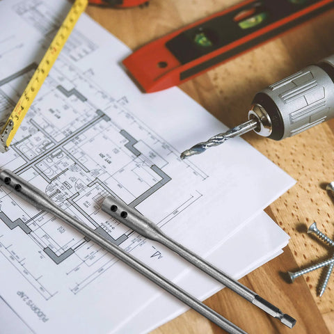 Four Piece Quarter Inch Spade Drill Bit Extension Set With Hex Shanks and Hex Keys, with 6 Inch and 12 Inch extension on blueprint