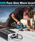 2000 Watt Pure Sine Wave Inverter for 24V DC with AC outlets and LCD in use on RV roof, powering electric tool