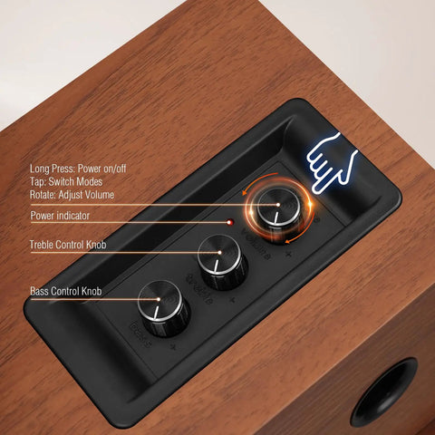 Control panel of Powered Bluetooth 5.3 Bookshelf Speakers with 60W Peak Output, volume, treble, and bass knobs, wooden finish.