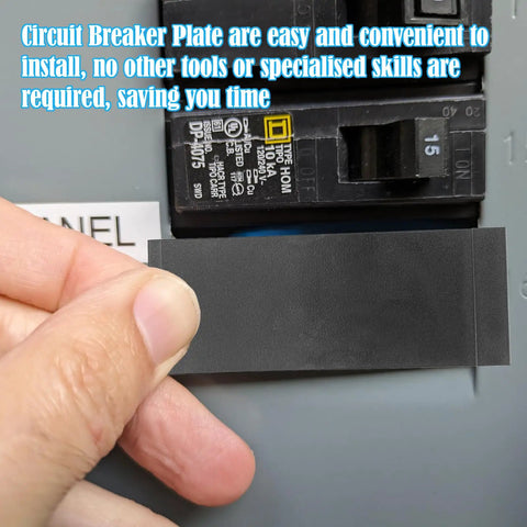 Hand holding a Knockout One Inch Breaker Filler Plate ready to install in an electrical panel for dust protection.