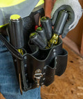 Technician with tool belt holding 4 Piece Square Recess Screwdriver Set With Color Coded Handles Heat Treated Chrome Plated Shafts