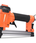 Badass Pneumatic Staple Gun That Knocks Out 22 Gauge Fasteners Without Any Hang Ups And Provides Ridiculously Smooth Operation For Reupholstering Chairs While Crushing Weekend Woodworking Builds. Close-up view of orange pneumatic staple gun with black handle.