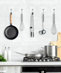 Heavy Duty 10 Pack Self Adhesive Hooks Set Removable Reusable Waterproof Transparent Wall Hangers holding kitchen tools on tiles