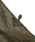 Corner detail of Supertarp Tarp Shelter In Pencott Wildwood Camo, Waterproof Ripstop Overland Camping Gear for serious weather.