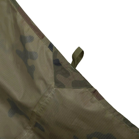 Corner detail of Supertarp Tarp Shelter In Pencott Wildwood Camo, Waterproof Ripstop Overland Camping Gear for serious weather.