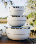 Double Wall Vacuum Insulated Stainless Steel Serving Bowl With Secure Lid And Nestable Build Keeps Your Grub Stacked And Cold Sides Ice Fresh For Backyard Blowouts Or Weekend Camping Runs In Crisp White Two Quart Capacity, three bowls stacked.