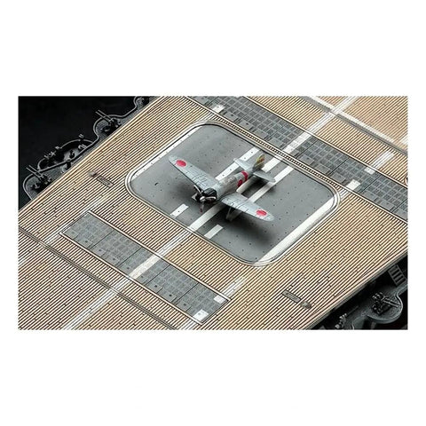 Top Shelf Japanese Imperial Akagi Aircraft Carrier Scale Model Kit With Drop Dead Detail And Foolproof Fit Designed For Serious Hobbyists Looking For A Killer Weekend Project, aerial view of model aircraft on deck.