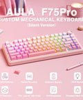 Dead Quiet Pink 75 Percent Wireless Mechanical Keyboard With Hot Swap Slots And Turn Dial, Bt50 And 24Ghz Wireless Setup, Pre Lubed Silent Switches With Rgb Backlight And Smooth Side Printed Pbt Keycaps For Your Killer Gaming Setup on a pink background.