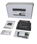 Rock Solid Eight Port Gigabit PoE Switch With Four Powered Ports And One Twenty Watt Budget industrial switch components laid out with manual and magnet kit.