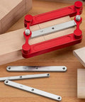 Top Tier Stainless Steel Center Gauge For Woodworking With Hella Sturdy Interchangeable Inch And Metric Marking Rods For Dead Accurate Hole Punch Locator Layout on a workbench with measuring rods.