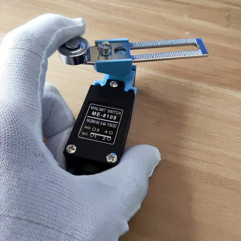Gloved hand holding Limit Switch Travel Switch With Adjustable Roller Lever Arm for CNC Mill Laser Plasma Router NC NO DPDT