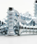 Solid Replacement Bed Rail Screws Heavy Duty Euro Fasteners For Your Ikea Malms Hemsnes Brimnes Bedroom Rig, zinc plated screws close-up.