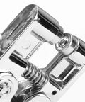 Close-up of Metal Handheld All In One Hole Puncher With Retainer For Office And Home Use Manual Punching Tool showing spring mechanism.