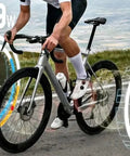Assioma Pro RL 2 Double Sided Power Meter Set For Look Keo Compatible Pedals on bike displaying power metrics on road