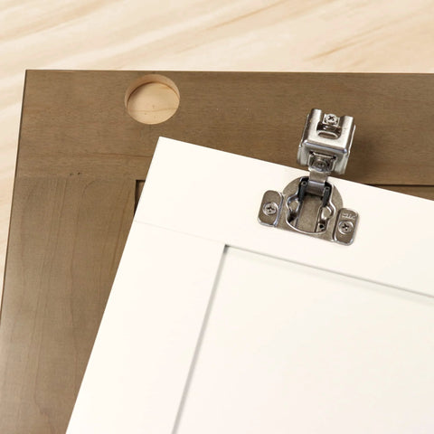 Concealed Cabinet Hinge Jig With 35 Mm Forstner Bit And Metal Bushing Drill Guide For Framed And Frameless Cabinets Precise Hinge Cup Holes Edge Alignment Tips Durable Diy Ready Jig For Fast Accurate Installations showing installed hinge on cabinet door.