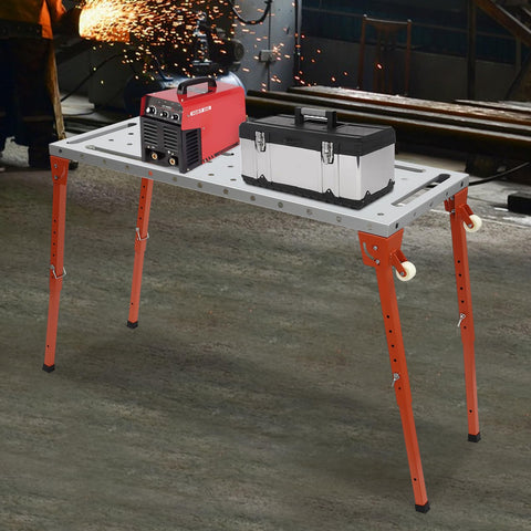 Rock Solid Foldable Welding Bench With Killer 1000 Lb Load Rating And Smooth Height Adjustments From 13 To 21 Inches with toolbox and welder.