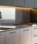 Matte Black Cabinet Pulls 25 Pack, 5.5 Inch Length With 5 Inch Hole Spacing installed on kitchen drawers and doors