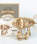 3D Wooden Airship Puzzle Kit For Kids And Adults Build Your Own Model Ship In 1 To 2 Hours 176 Laser Cut Pieces With Easy Instructions And Sandpaper showing completed model and packaging.