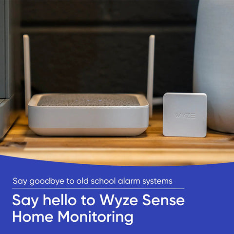 Wyze Sense home monitoring system with core kit and hub beside wireless entry sensors for home security automation.