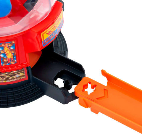 Close-up of Hot Wheels Downtown Candy Shop Playset with gumball machine and orange speed snap track detail.