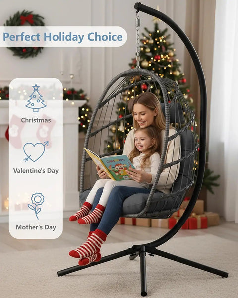 Cozy Outdoor Egg Chair With Stand, Wicker Hanging Swing Chair With Cushion, 350 Lb Weight Capacity For Patio Garden Balcony And Bedroom, Tool Free Assembly In Under 30 Minutes, Dark Grey showing a mother reading to child during holidays.