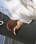 Feet on a Grounding Mat Kit 2 Pack With Grounding Cords And Wrist Straps For Better Sleep 10 By 26.7 Inches Waterproof Soft Krypton Fiber