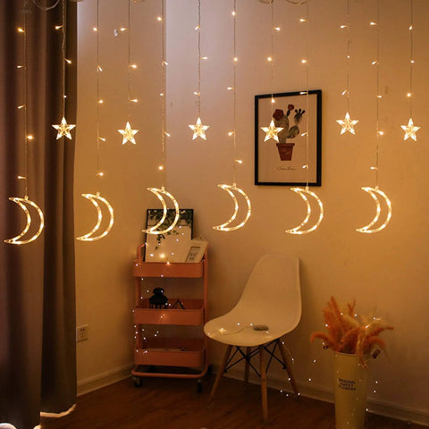Ramadan Curtain Fairy Lights With Remote, 138 LED 8.2ft By 3.2ft Star And Moon Shaped String Lights, Warm White, 8 Modes displayed indoors